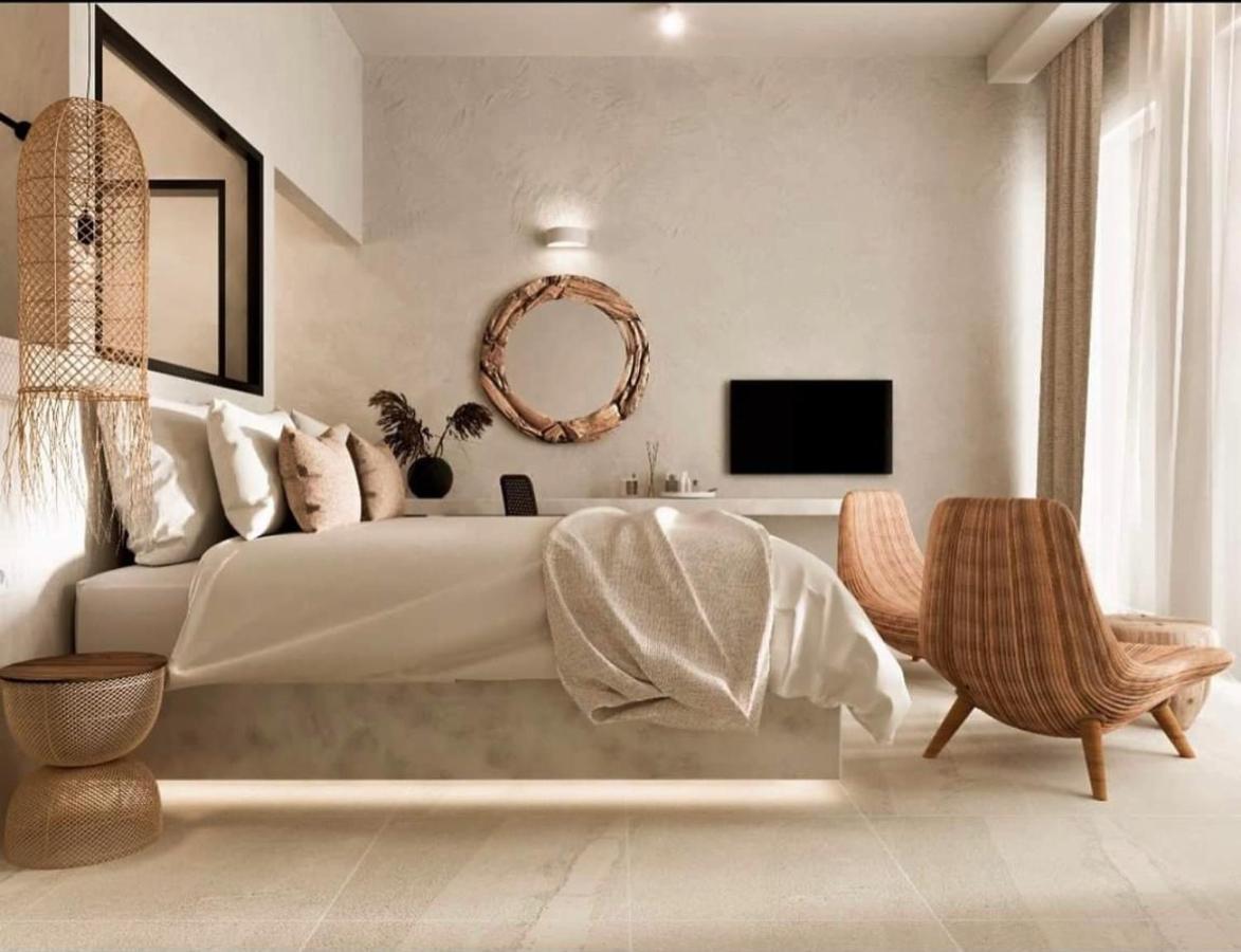 Delfini Beach Hotel & Suites อาร์คานเยโลส ภายนอก รูปภาพ