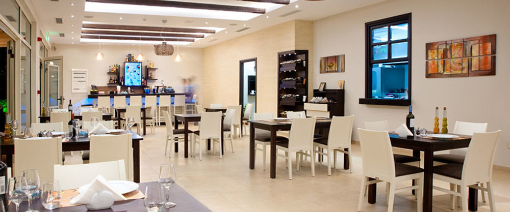 Delfini Beach Hotel & Suites อาร์คานเยโลส ภายนอก รูปภาพ